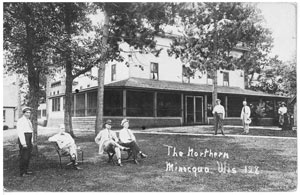 Sitting outside the Historic Northern Hotel in Minocqua - now Nitschke's Northern Resort